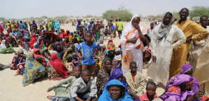 A handout photo released by the World Food Programme (WFP) shows people evacuated from the Nigerien islands of Lake Chad as they arrive in N'Guigmi on May 5, 2015. Around 25,000 Niger nationals who fled islands in Lake Chad over fears of attack from the Boko Haram jihadist group are living in &quot;dramatic&quot; conditions on the mainland, a UN source said on May 6, 2015. AFP PHOTO / WORLD FOOD PROGRAMME -- RESTRICTED TO EDITORIAL USE - MANDATORY CREDIT &quot; AFP PHOTO / WORLD FOOD PROGRAMME &quot; - NO MARKETING NO ADVERTISING CAMPAIGNS - DISTRIBUTED AS A SERVICE TO CLIENTS  --